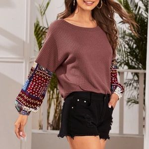 Patterned sleeve waffle knit top
